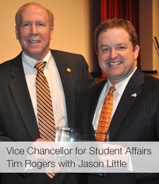 Vice Chancellor for Student Affairs Tim Rogers with Jason Little