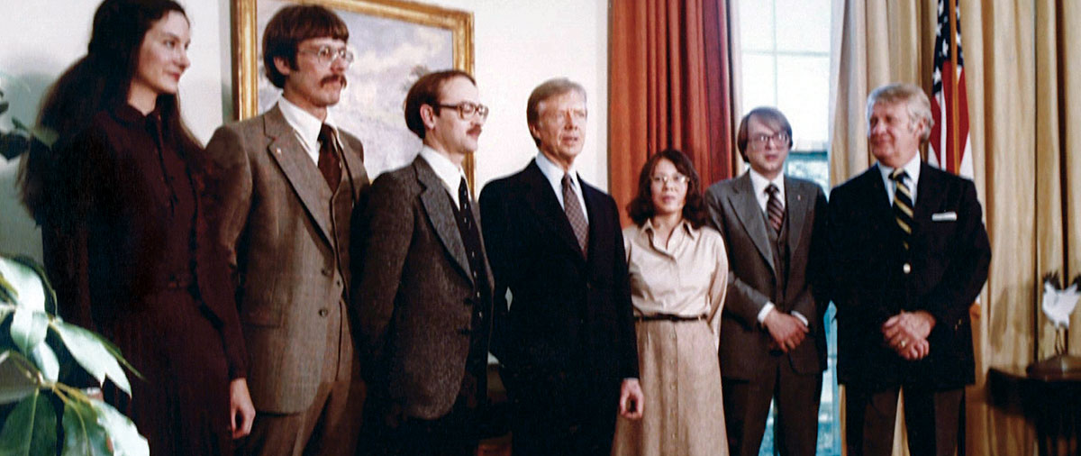 Kathleen Stafford (far left) and Joe Stafford (third from left) meet with President Jimmy Carter (center) at the White House shortly after escaping from Iran.