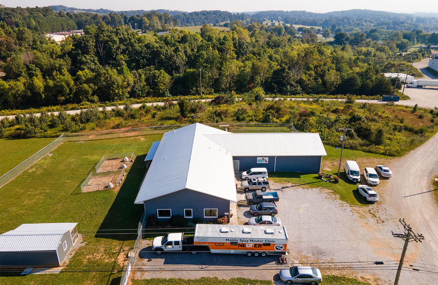 Aerial view of mobile unit at Jefferson County Humane Society, surrounded by rural scenery