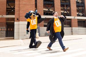 Connor and Smokey strut across the crosswalk by Neyland like the Beatles on the cover of Abbey Road